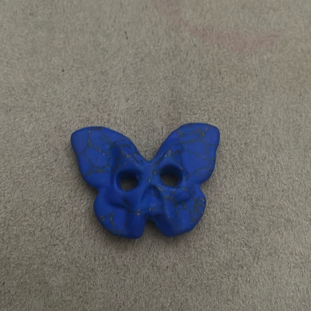 Gold,blue butterfly stone